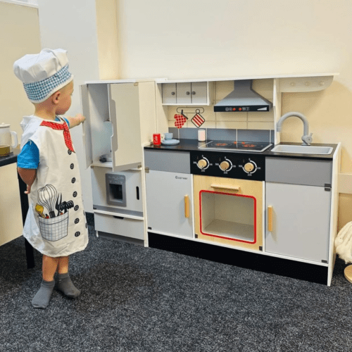 Pretend Play Kitchen Toy with Freestanding Refrigerator designed for children ages 3 and older.